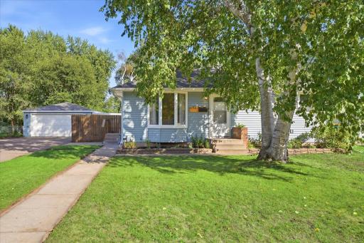 Welcome home! Charming curb appeal, mature trees and a detached garage set the scene for this move-in-ready home.