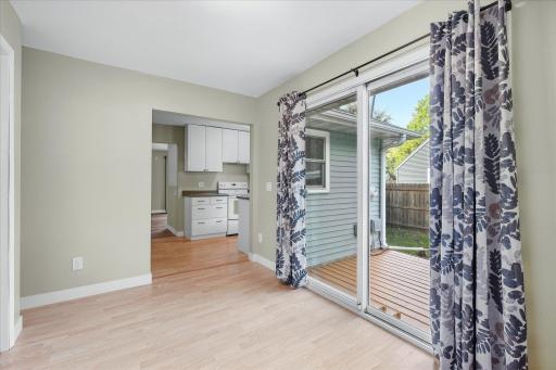 Conveniently connected to the kitchen, this sunny space works beautifully for everyday dining or entertaining.