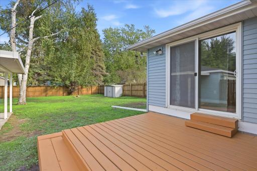 Step directly from the home onto the backyard deck—an ideal spot for morning coffee, grilling, or unwinding at the end of the day.