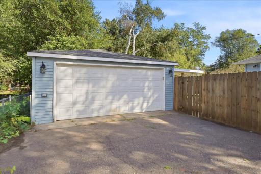 A spacious detached garage provides secure off-street parking plus additional room for bikes, tools, and seasonal gear.