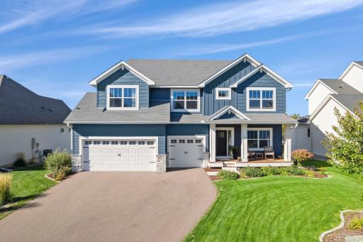 Stunning 2022-build in a beautiful Prior Lake setting, backing to a pond and wetlands where the views change with the seasons and wildlife is part of the scenery.