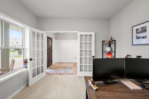 A dedicated main-level office adds a quiet place to work.
