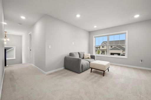 Upstairs, four well-sized bedrooms are joined by a versatile den.