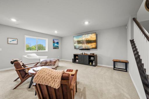 Comfortable family room with plush carpeting.