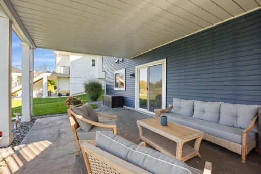A covered patio with a rain-protected ceiling creates another spot to enjoy the outdoors in just about any weather.