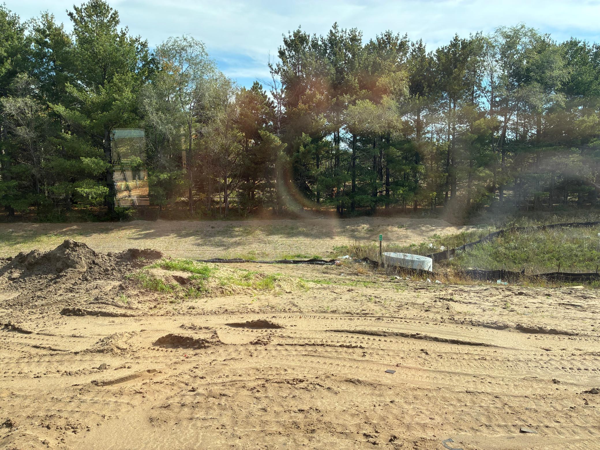 (Photo is of the actual backyard in progress.)