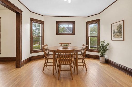 Formal dining on main level Hardwood floors (virtually staged)