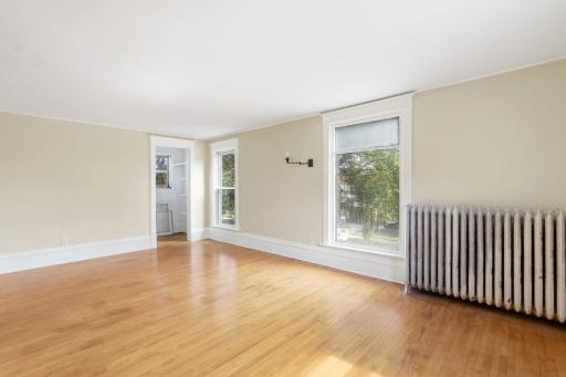 Upper level living room or primary bedroom