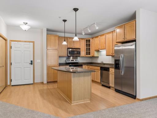 Welcoming entry with convenient storage and easy access to the kitchen.
