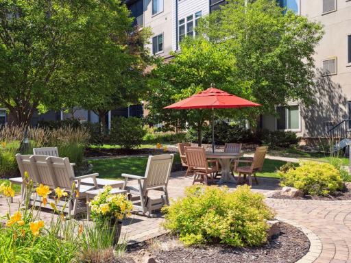 Enjoy outdoor dining and relaxation on the beautifully furnished garden patio.