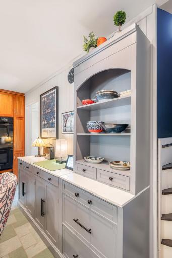 This piece adds tons of storage and would be a great spot for a coffee bar!