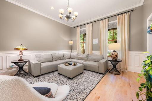 Gleaming new hardwood floors throughout seamlessly connect each room.