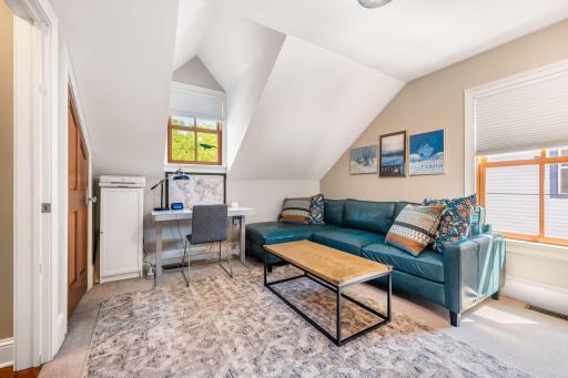 Check out this incredible upper level loft space-could be a second family room or guest space.
