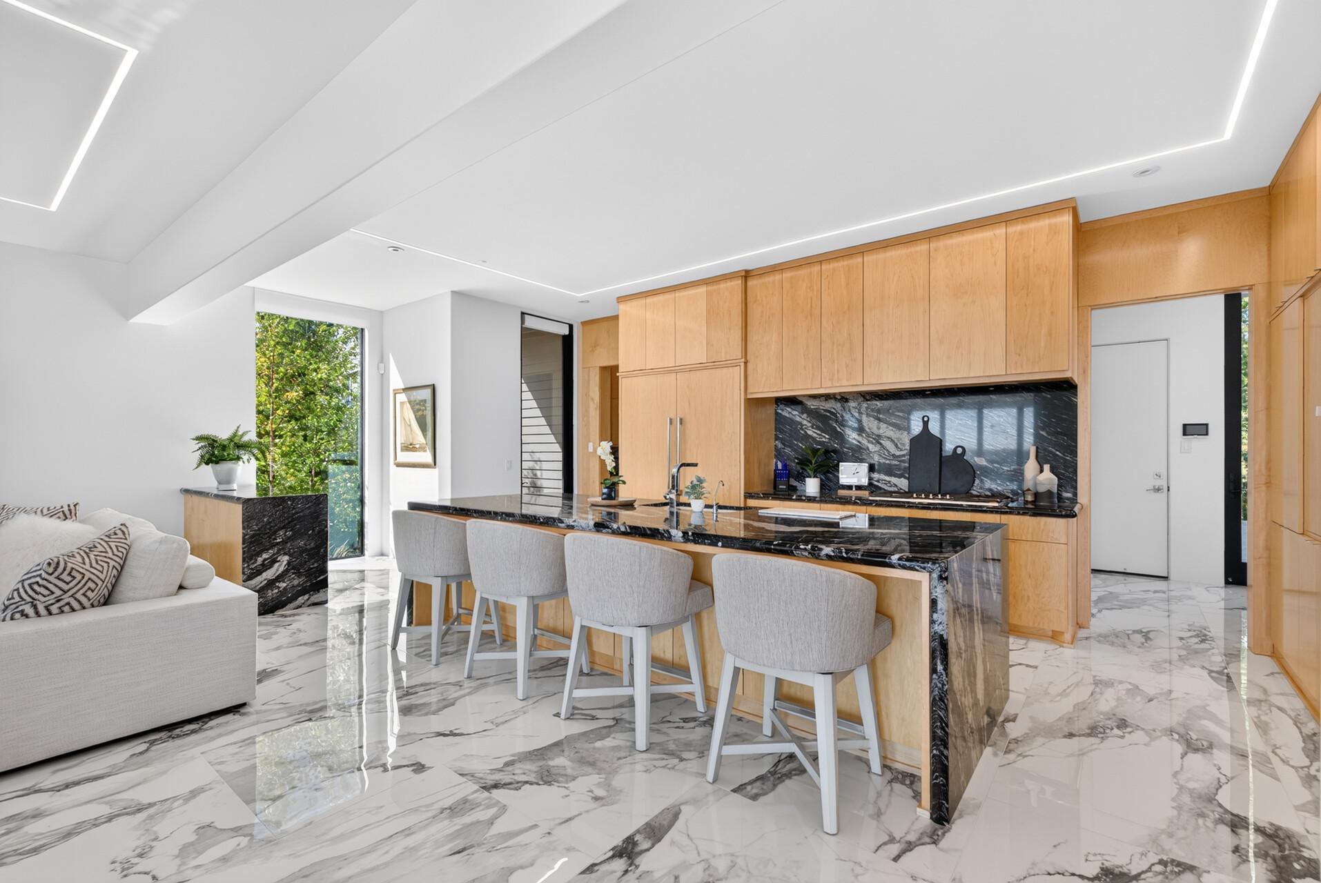 The custom kitchen is a true focal point.