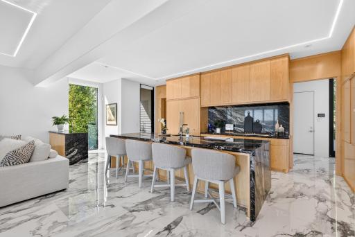 The custom kitchen is a true focal point.