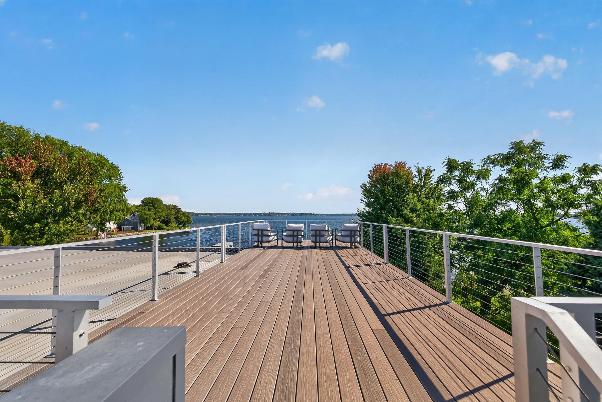 The rooftop terrace rises above it all, offering panoramic lake views,