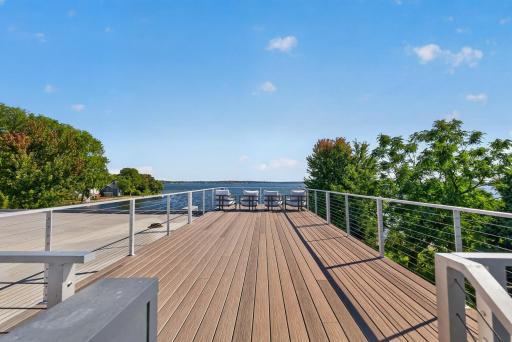 The rooftop terrace rises above it all, offering panoramic lake views,