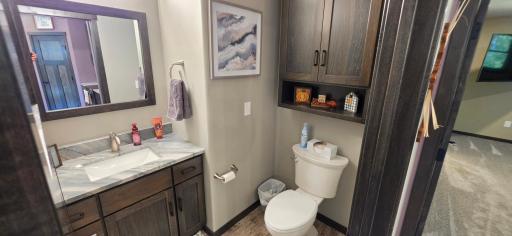 1/2 bath off kitchen, very well appointed