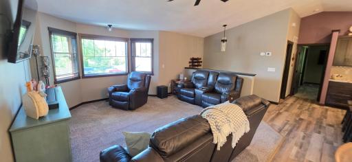 Large living room with an awesome ceiling fan!