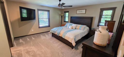 15x15 primary bedroom with top of the line flooring