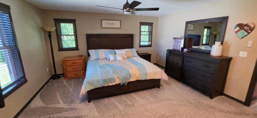Appreciate the trim style, custom fitted wood blinds, and plush carpet