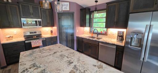 Under cabinet lighting with dimmer switch for that middle of the night ambiance!