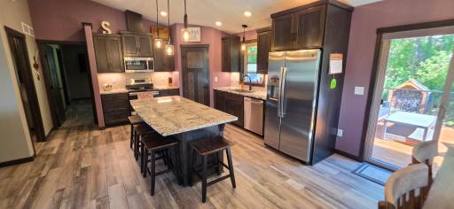 So much light in the kitchen with top notch fixtures!