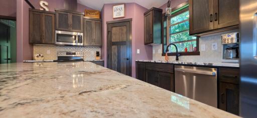 Corner pantry for all the storage, plus an exclusive stand mixer cupboard left of the sink!
