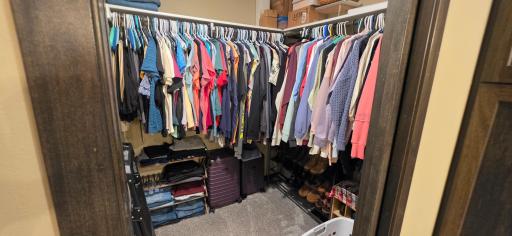 Finish off the primary suite with the walk in closet complete with pocket door and cubby in the back!