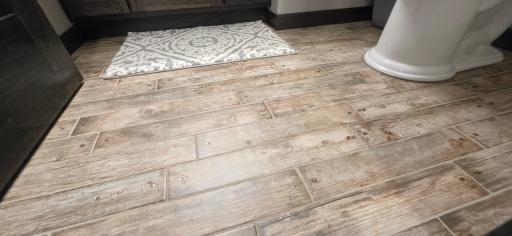 1/2 bath tile flooring is so cool!