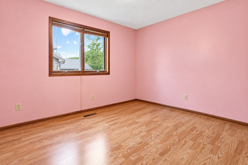Main floor 2nd bedroom. Virtually enhanced. Furniture and personal belongings removed.