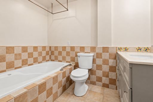 Lower level full bath. Virtually enhanced. Furniture and personal belongings removed.