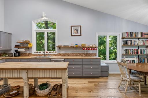 Charming chef's kitchen â the heart of the home for morning coffee and family meals.