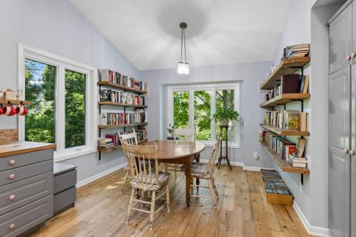 Sunny breakfast nook surrounded by windows â start your day surrounded by natural light.