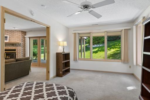 Another angle - A serene bedroom retreat, thoughtfully designed for rest and relaxation - on of two bedrooms in lower level.