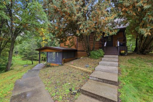 Enter either in the front door to the right, or the lower level walk-in to the left!