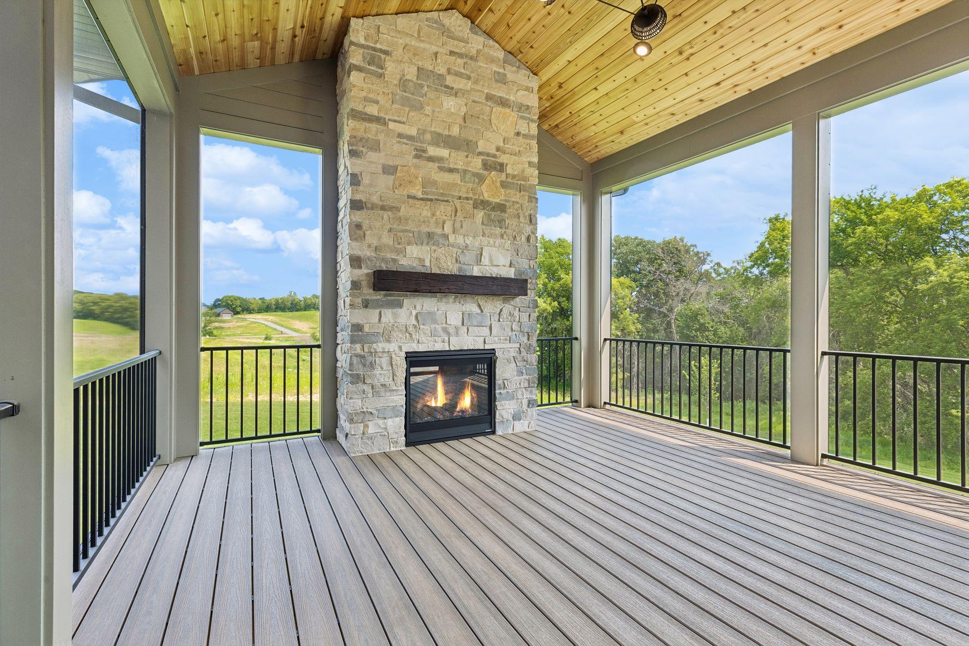 Screened in porch with stone, gas fireplace!