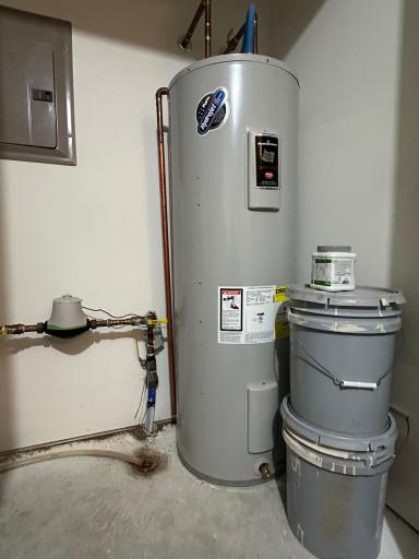 Water heater in this space as well and water shut offs in here too.