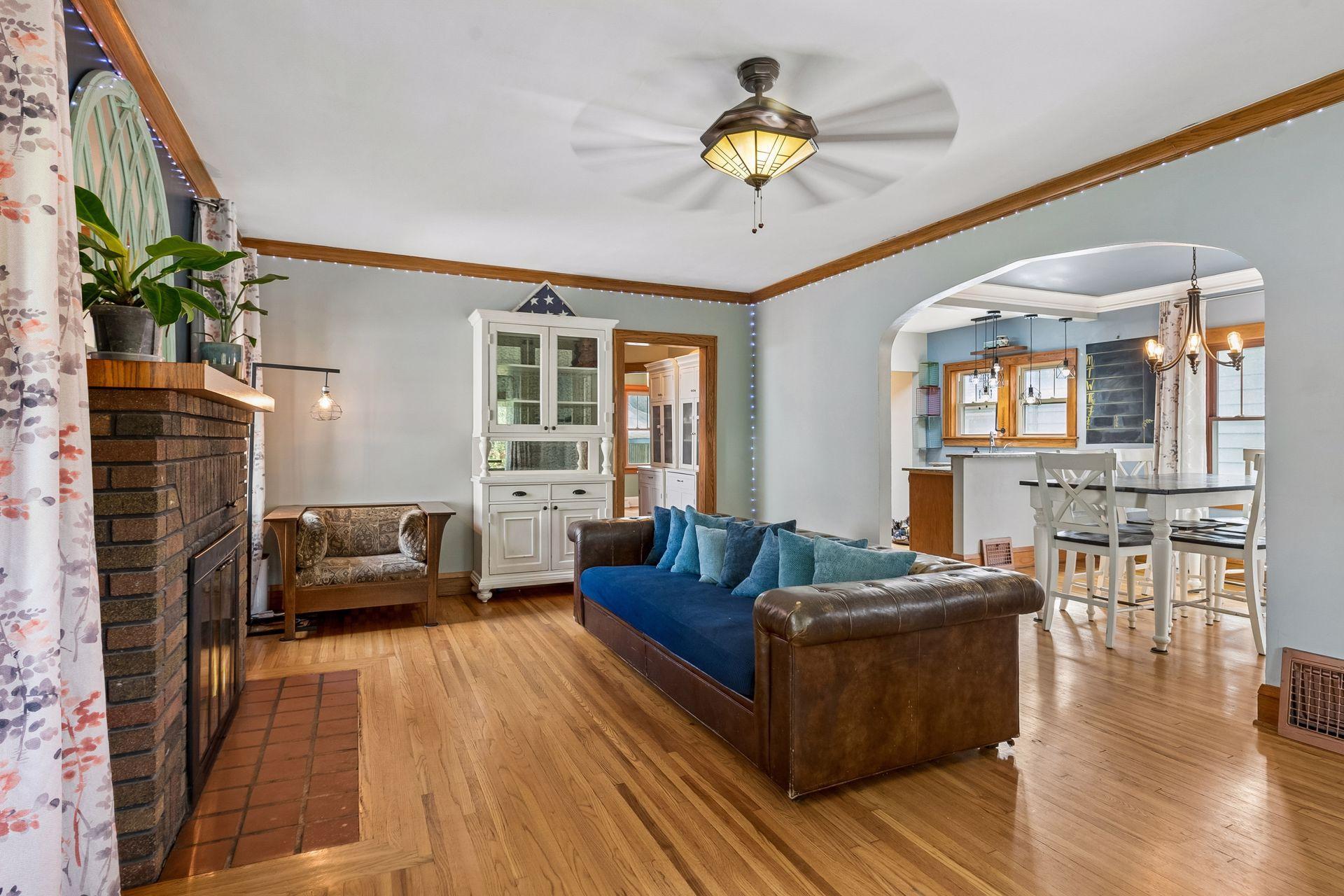 From the living room you can see straight through to the dining room and kitchen, which makes hosting easy. The hallway leads to the main level bedroom and bath.