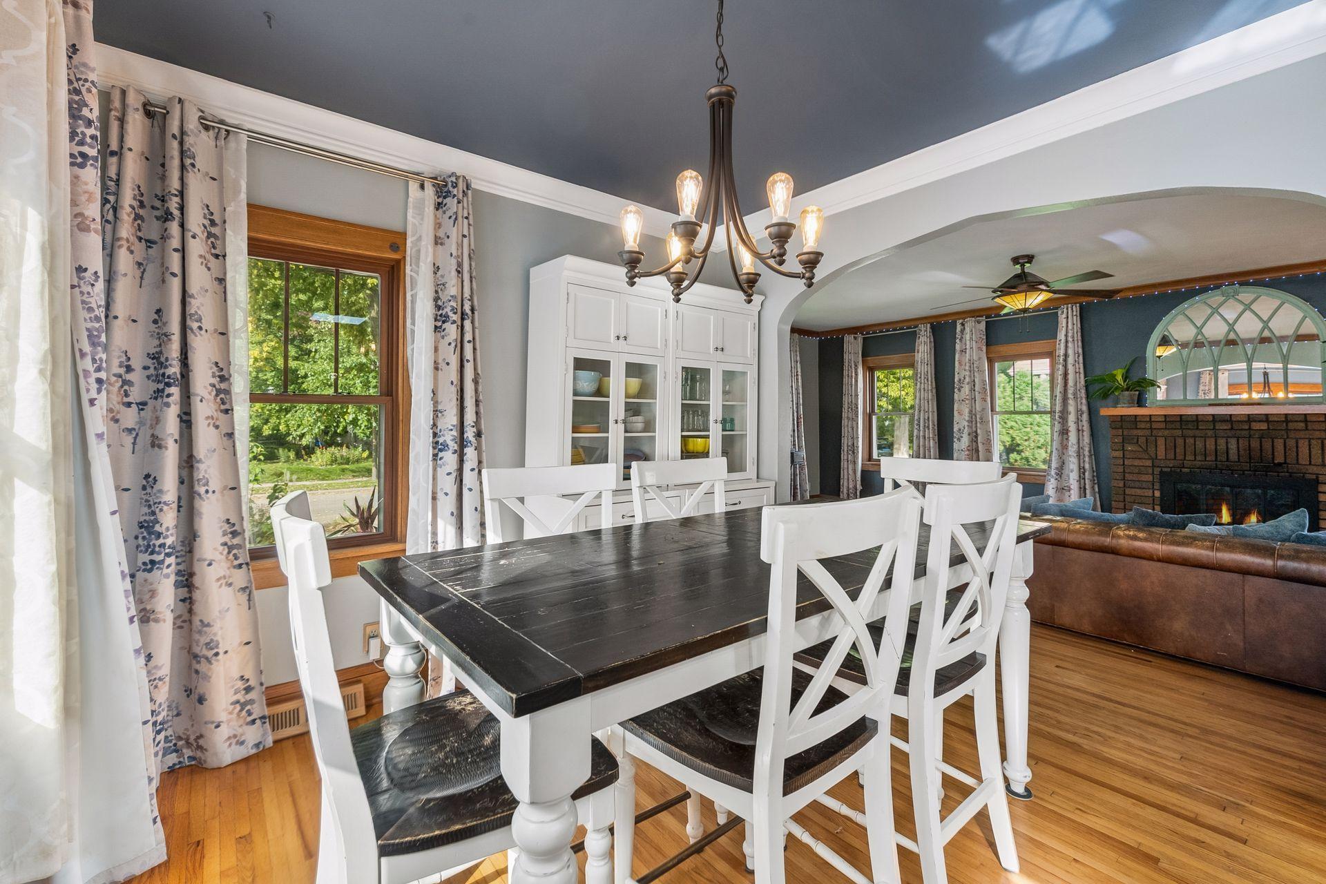 Seated at the dining table, you can still see the fireplace glowing in the living room. It's a great layout for keeping everyone together.