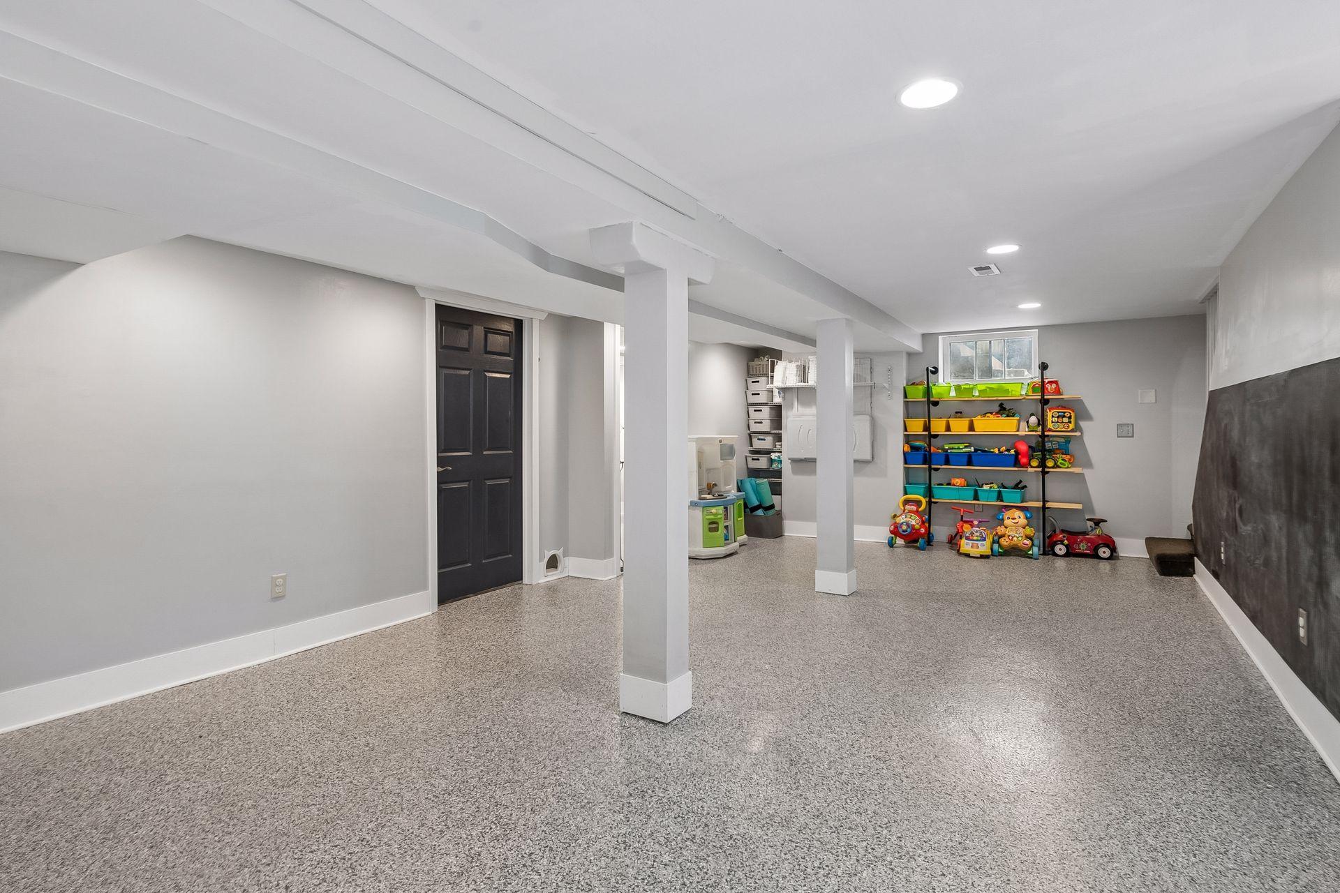 Built-in shelving and plenty of open floor space make the lower level easy to set up however you like. Storage areas keep everything organized.