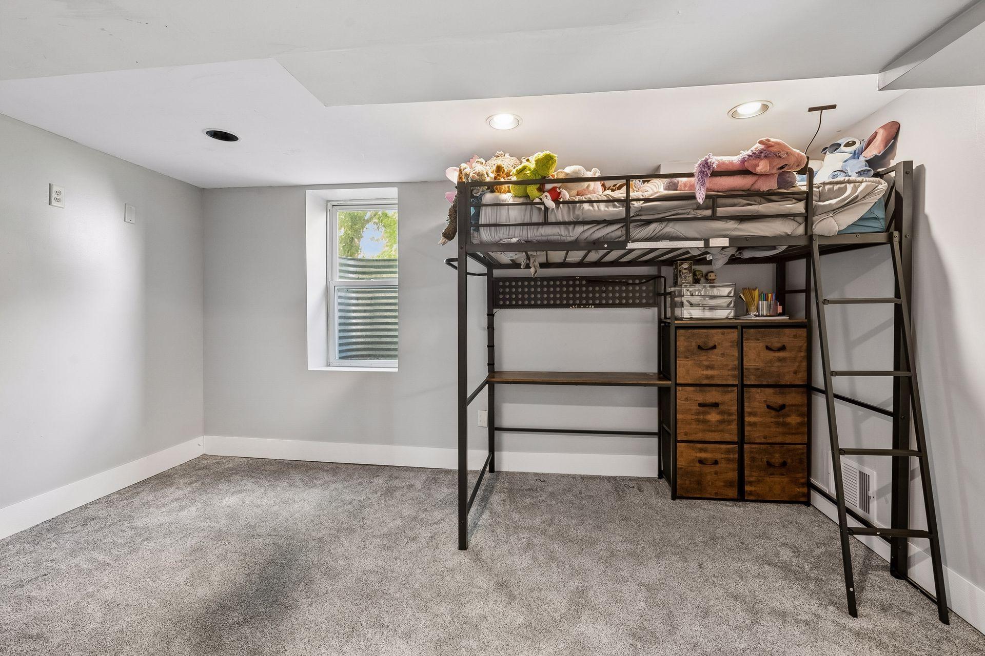 The third bedroom sits on the lower level and has new carpet, recessed lighting, and a window for natural light. Bedrooms on separate levels offer extra privacy.