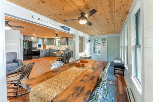 Dining Area is surrounded by windows.
