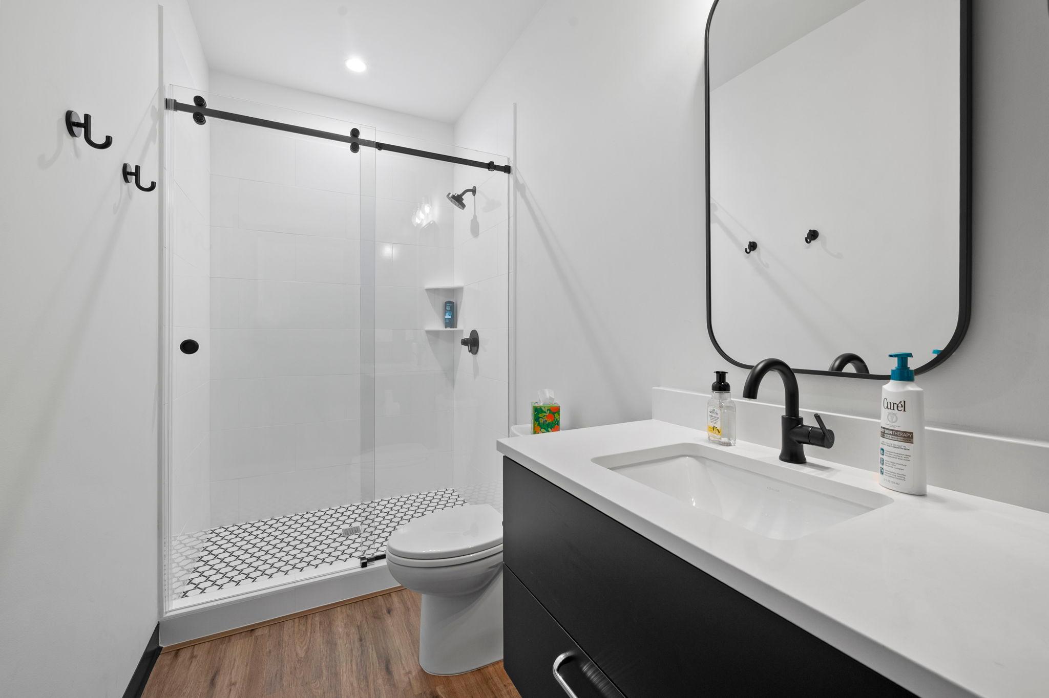 The loft also includes a ¾ bath with ceramic shower. Bath fans and the cooktop hood are vented to the exterior.