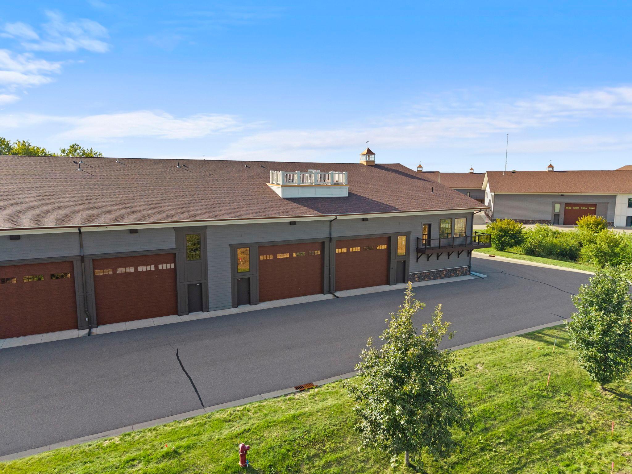 Welcome to an exceptional finished garage condo at the prestigious Medina Automotorplex, thoughtfully designed and professionally built out for the serious collector, automotive enthusiast, or hobbyist.