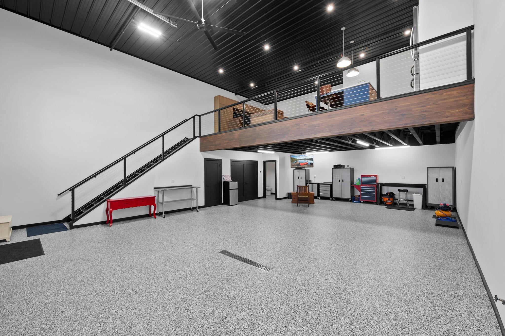This impressive space offers the perfect combination of functionality, security, and flexibility, whether you envision it as a private collector garage, professional-grade workshop, or one-of-a-kind automotive retreat.