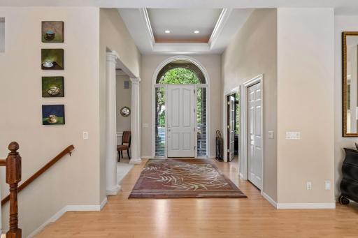 The moment you enter you'll be impressed with the details...8 ft. door, palladian window and recessed tray ceiling.