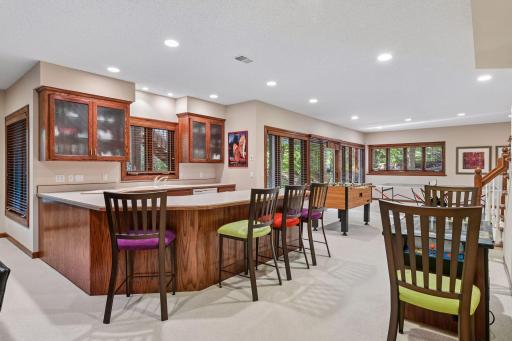 This expansive walkout lower level provides flexible recreation space for games, entertaining and hobbies.