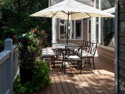 Secluded deck runs along the entire back of home.