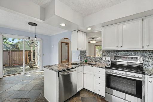 Amazing open flow with sliding glass door to large deck